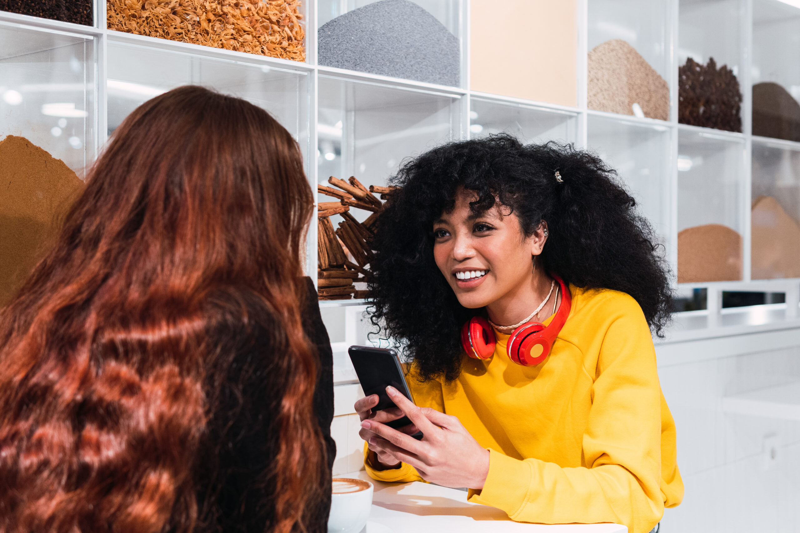 Customer receiving an automated welcome SMS in a store